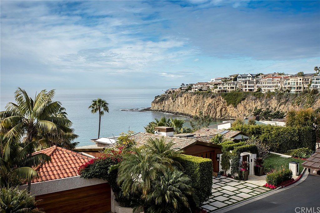 The bluff and the bay, the cove curving south toward the cliff